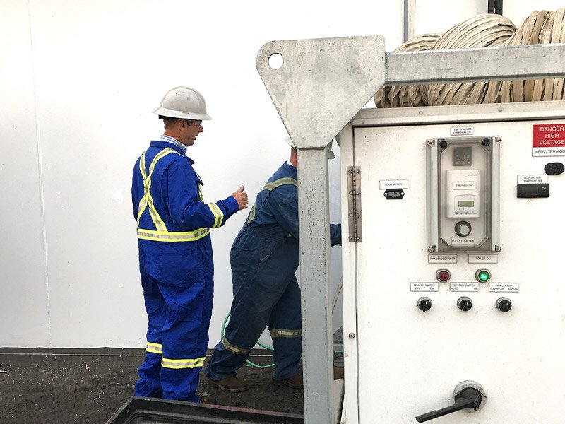service technician working on control unit