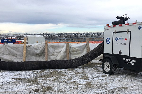 diesel heater with ductwork for heat hoarding on bridge project